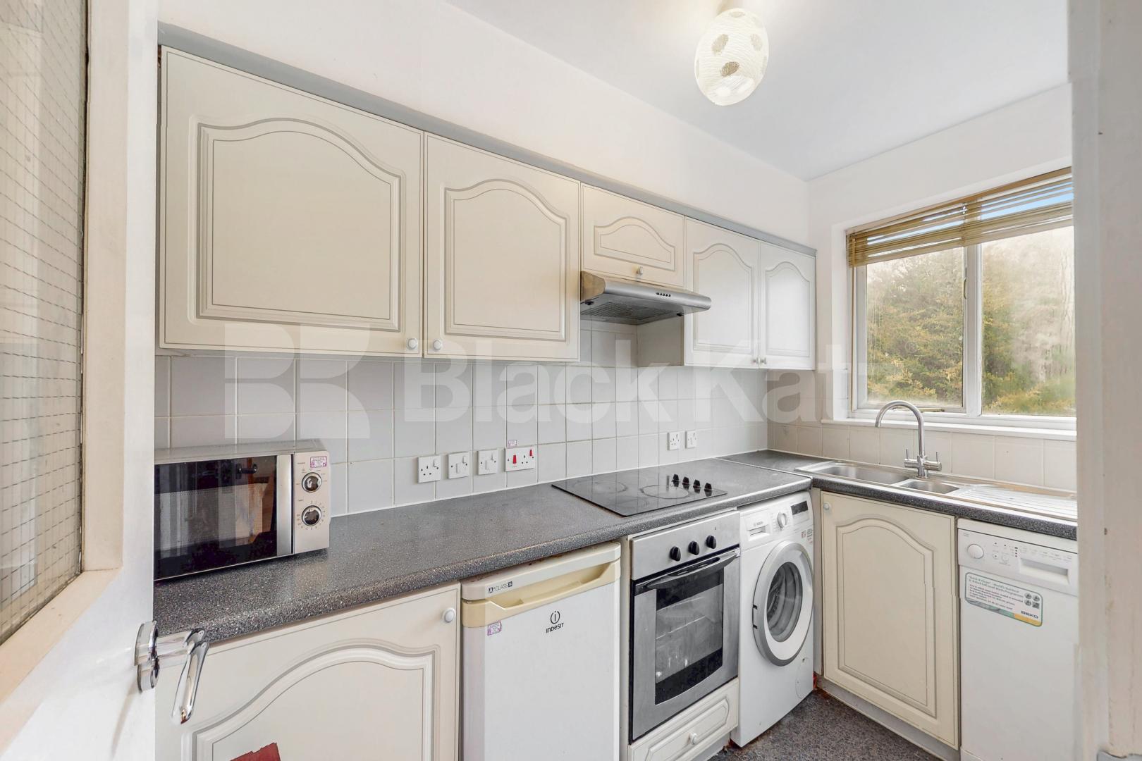 Top floor private development with charming balcony, communal gardens & parking Towergate , Pages Walk 